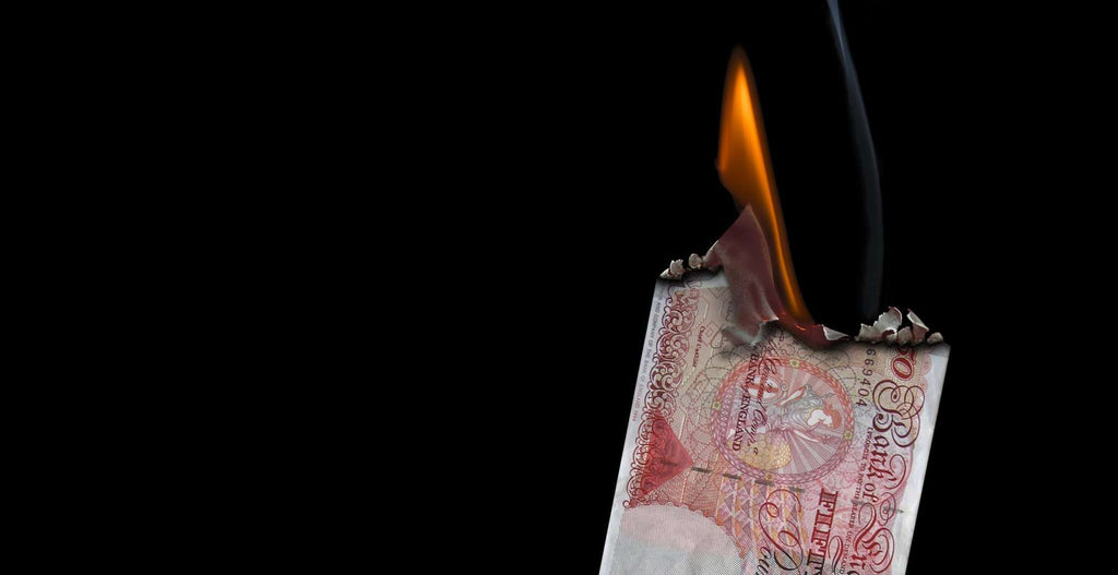 Burning £50 note