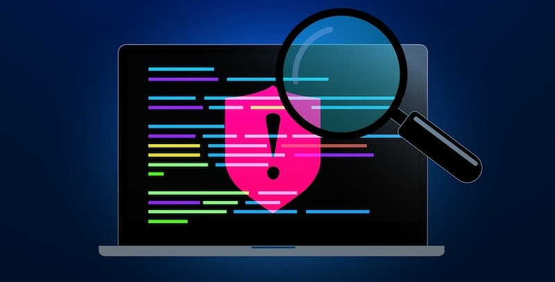 Laptop screen with code and a magnifying glass on a dark blue background