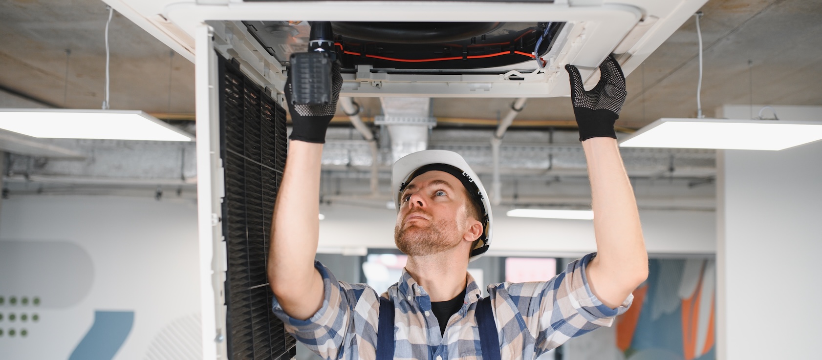 Engineer working on HVAC systems