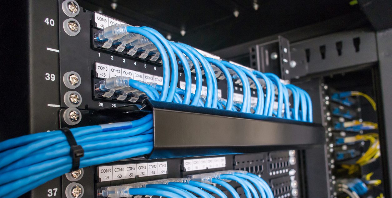 Ethernet cables and path panel in rack cabinet